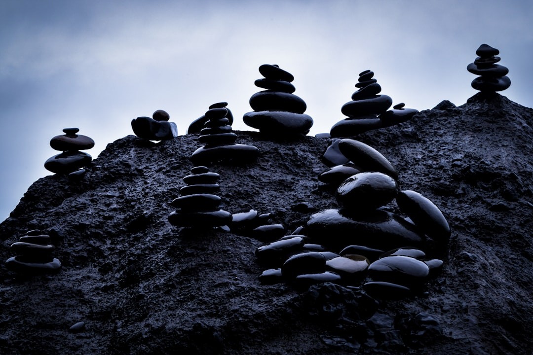 low-angle photography of stack of stones